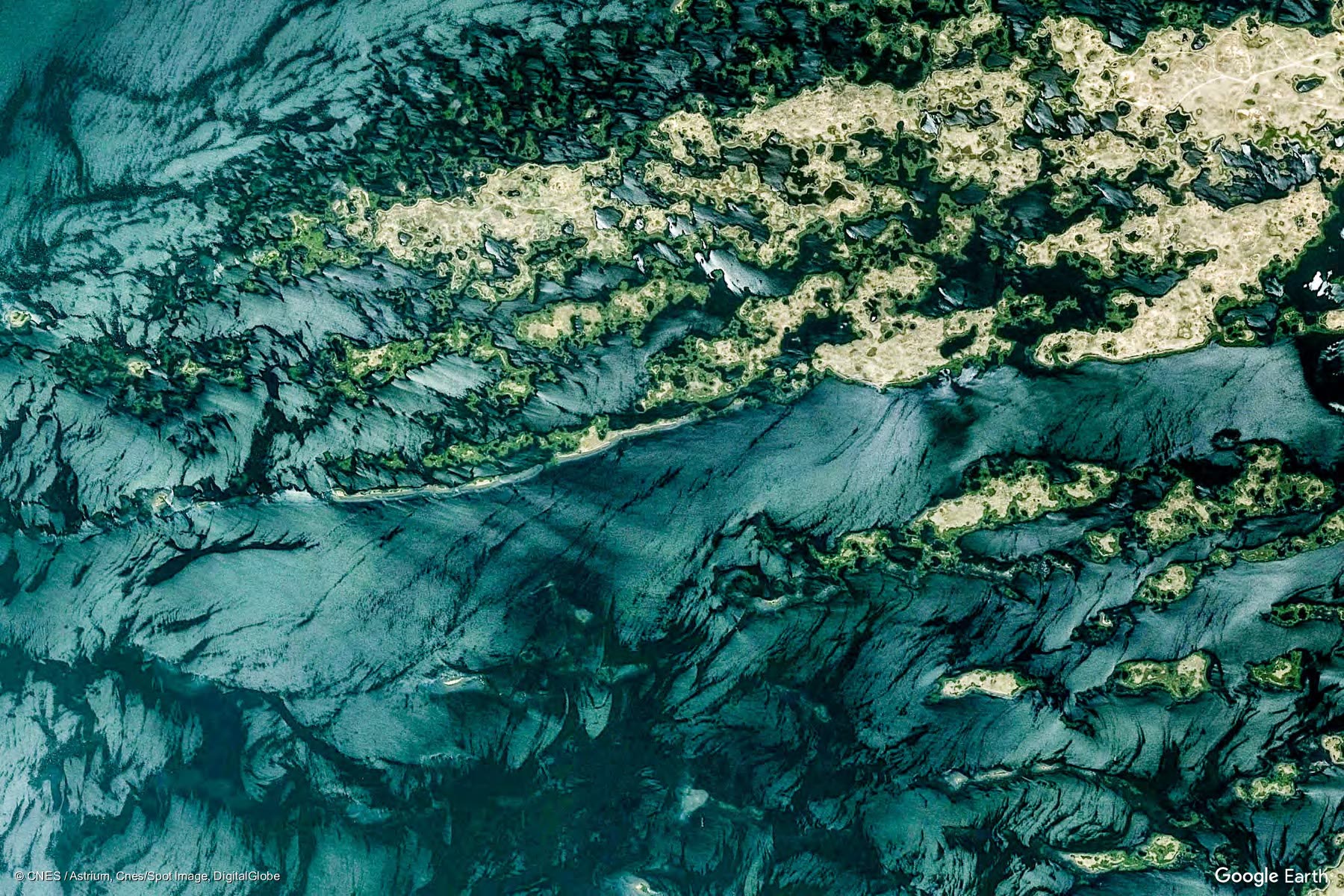 Aerial view of river valleys and ridges in the Forish District, Uzbekistan